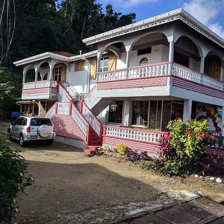 Mainroad Suite Calibishie Esterno foto