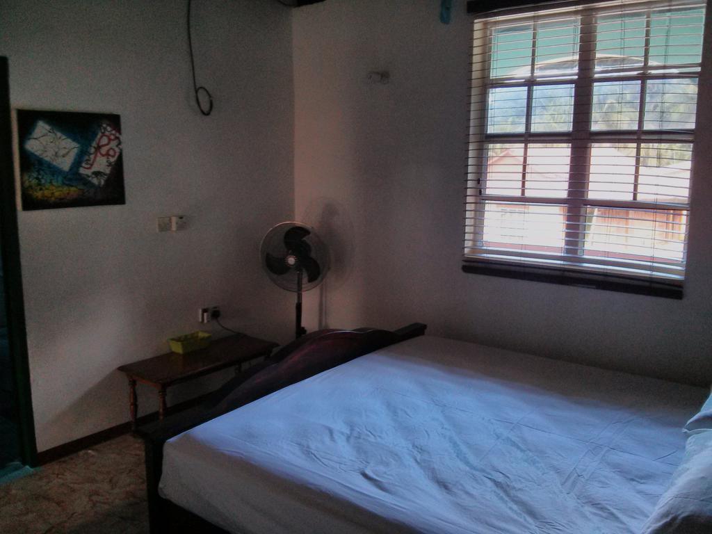 Mainroad Suite Calibishie Esterno foto