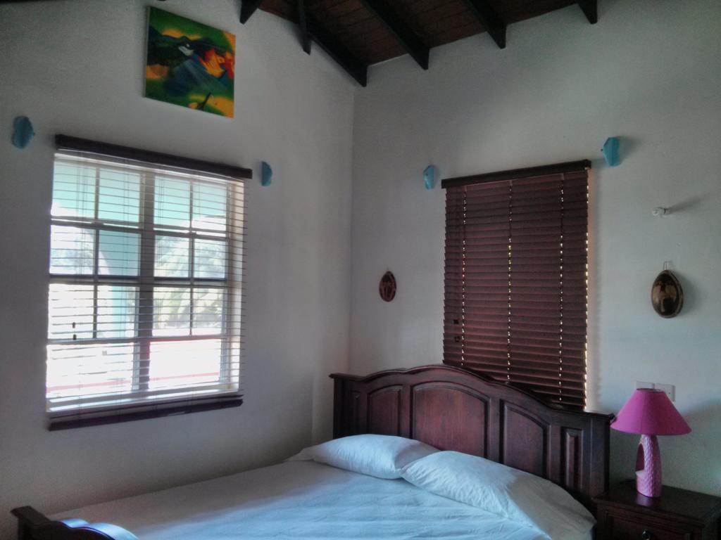 Mainroad Suite Calibishie Esterno foto