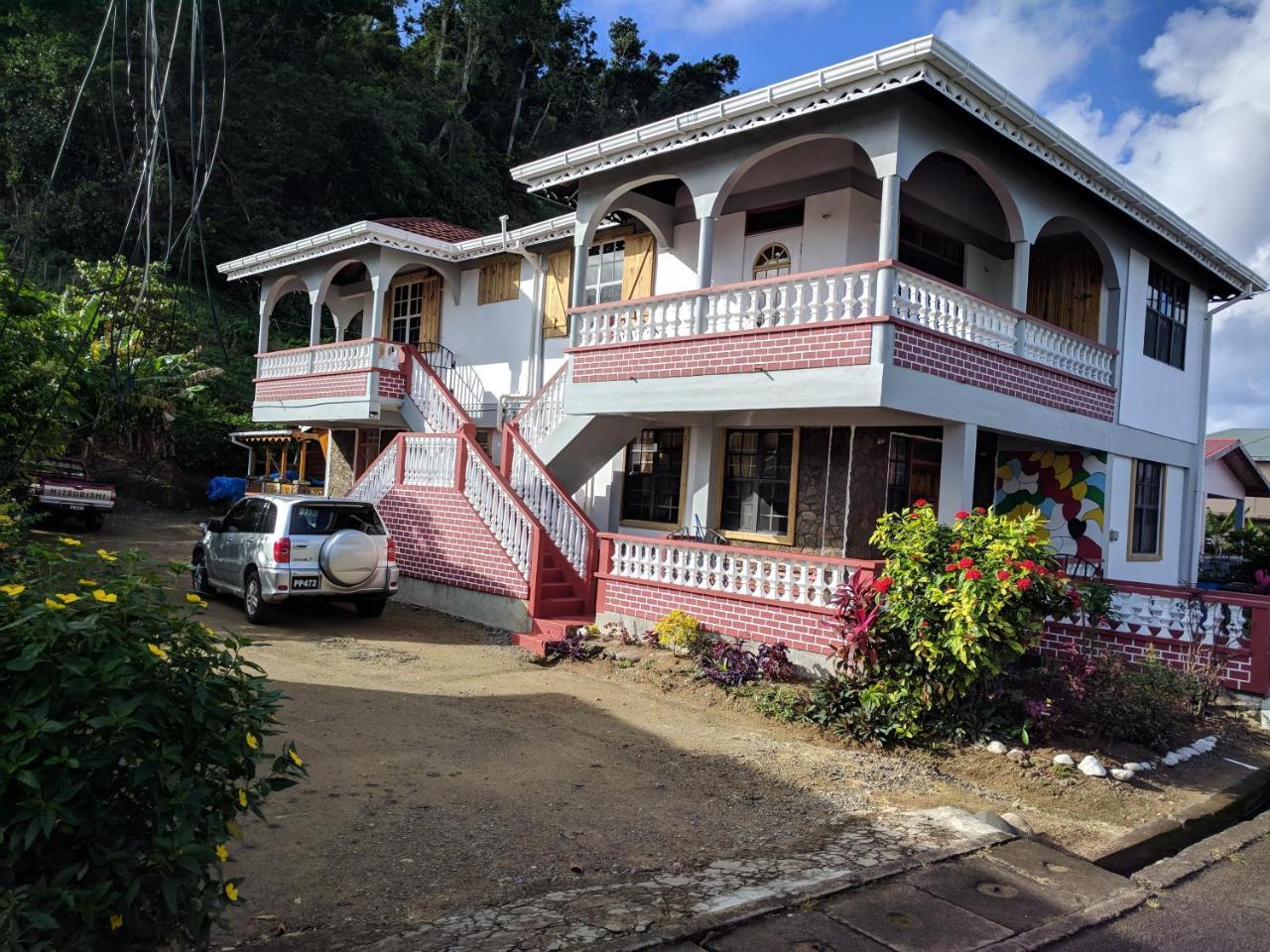 Mainroad Suite Calibishie Esterno foto